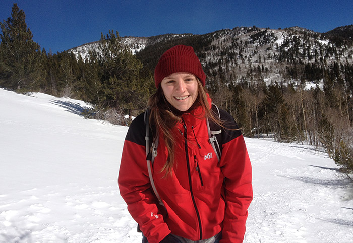 Marielle Martin snowshoeing in the mountains