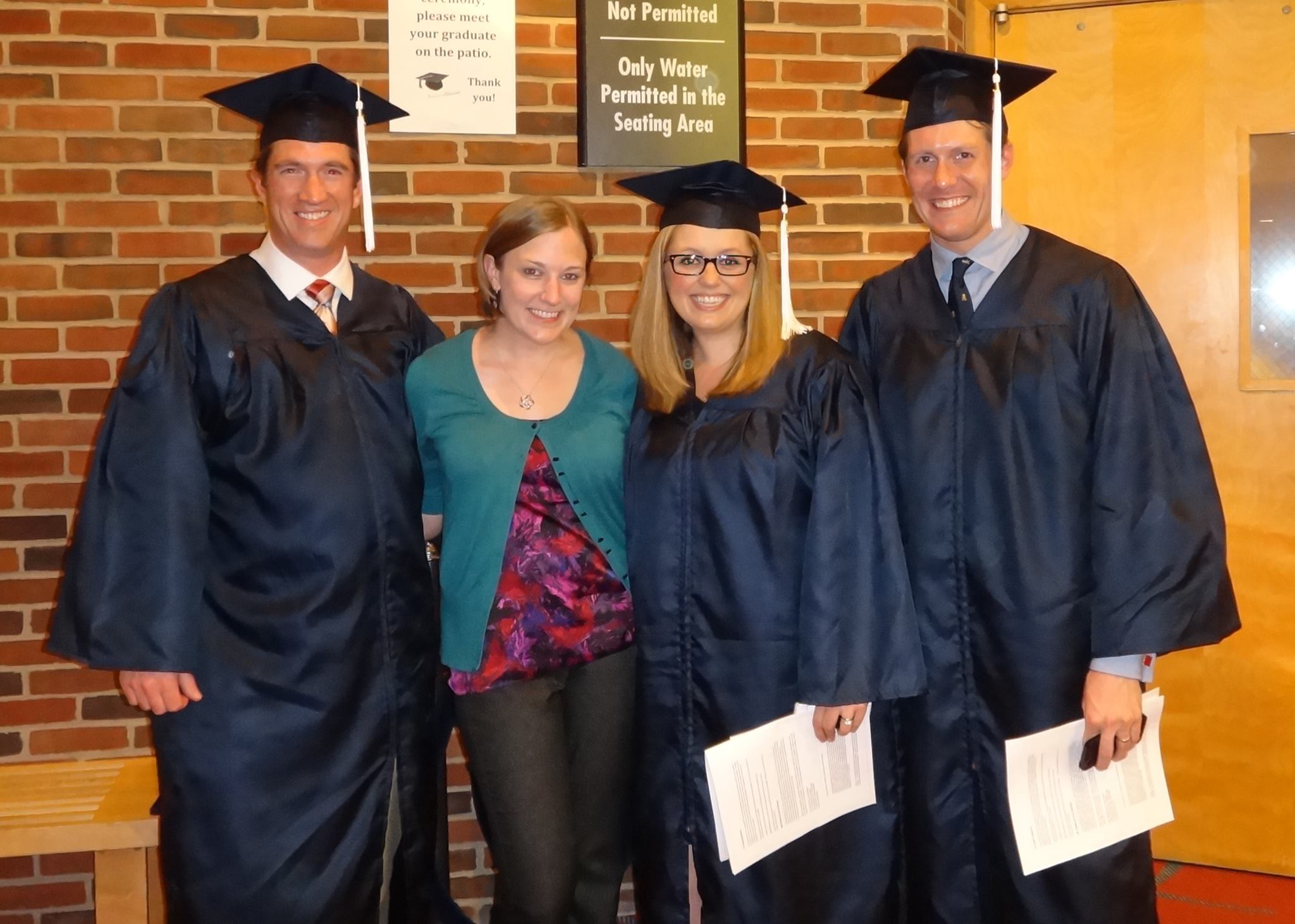 ESP Graduates Mark Staub, Vanessa White and Geoffry Soura with Brandi Robinson