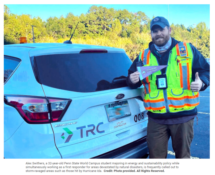 Alex Ida standing in front of the TRC car